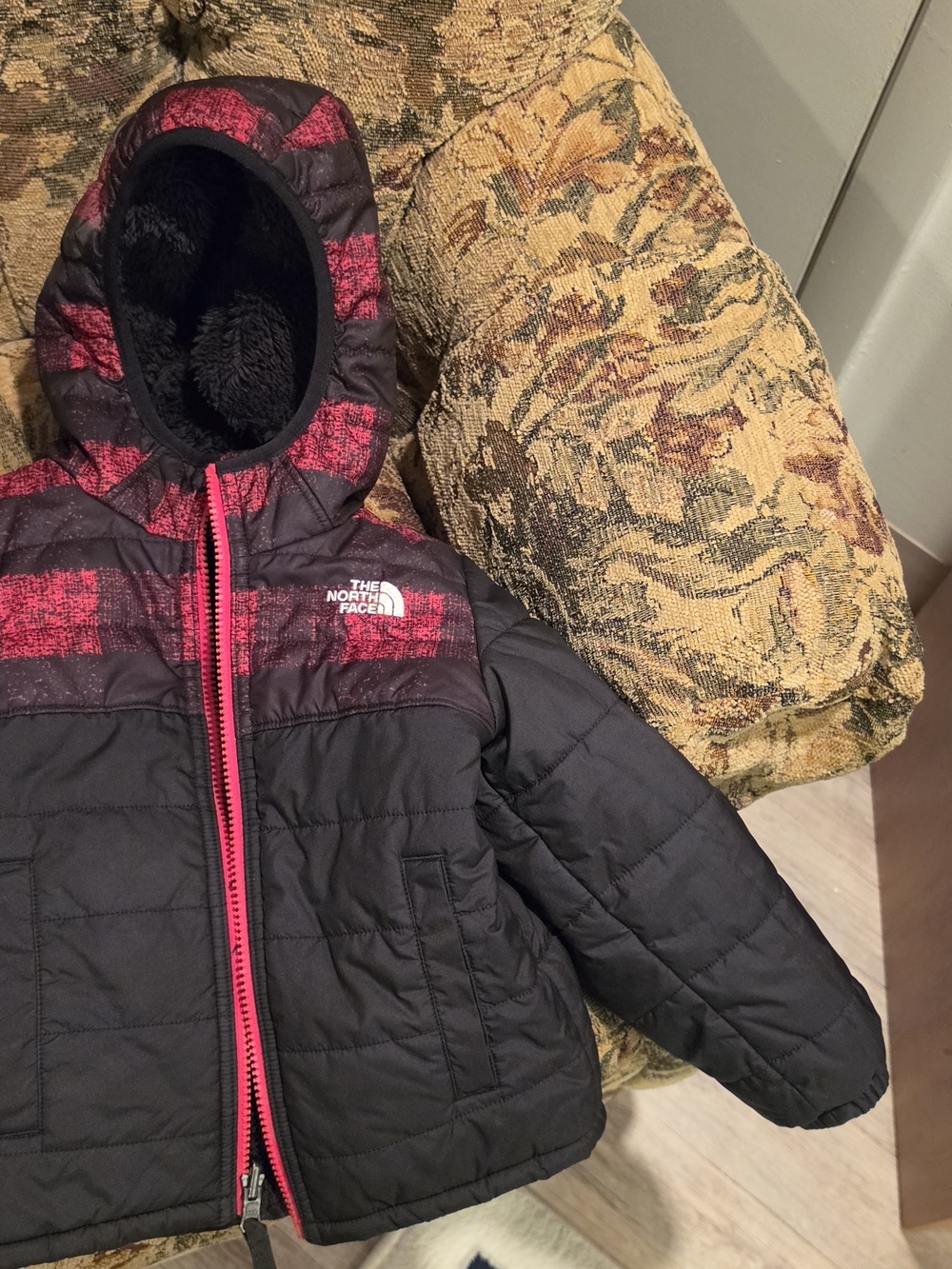 The North Face Kids Black Jacket with Pink Hood Accents